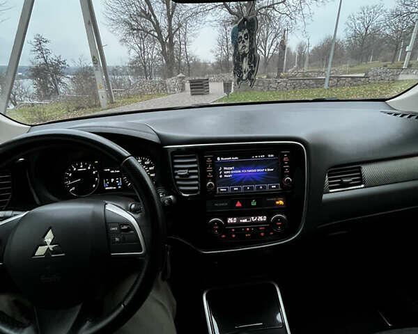 Синій Міцубісі Аутлендер, об'ємом двигуна 2.36 л та пробігом 144 тис. км за 16700 $, фото 14 на Automoto.ua
