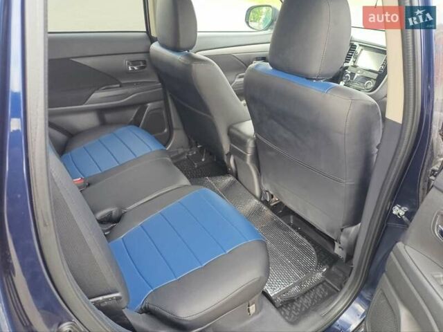 Синий Мицубиси Аутлендер, объемом двигателя 2.4 л и пробегом 134 тыс. км за 15200 $, фото 6 на Automoto.ua