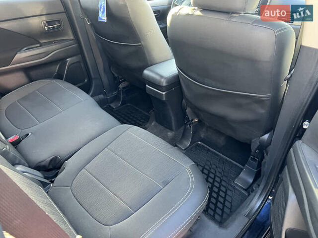 Синий Мицубиси Аутлендер, объемом двигателя 2.36 л и пробегом 150 тыс. км за 15500 $, фото 13 на Automoto.ua