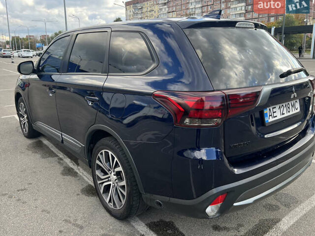 Синий Мицубиси Аутлендер, объемом двигателя 2.36 л и пробегом 150 тыс. км за 15500 $, фото 5 на Automoto.ua