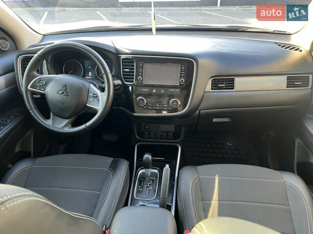 Синий Мицубиси Аутлендер, объемом двигателя 2.36 л и пробегом 150 тыс. км за 15500 $, фото 10 на Automoto.ua