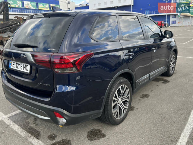 Синий Мицубиси Аутлендер, объемом двигателя 2.36 л и пробегом 150 тыс. км за 15500 $, фото 9 на Automoto.ua