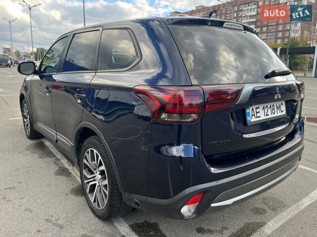 Синий Мицубиси Аутлендер, объемом двигателя 2.36 л и пробегом 150 тыс. км за 15500 $, фото 6 на Automoto.ua