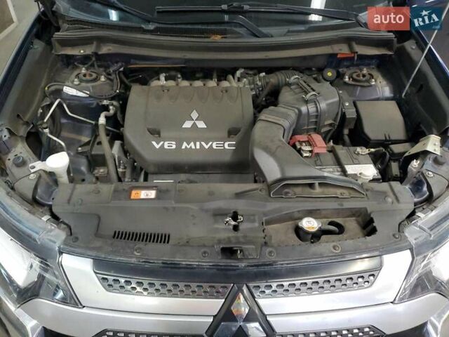 Синий Мицубиси Аутлендер, объемом двигателя 3 л и пробегом 80 тыс. км за 2900 $, фото 11 на Automoto.ua