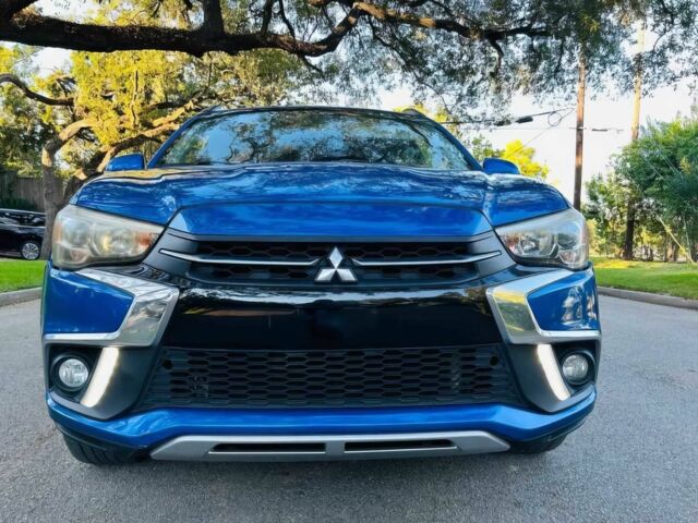 Синий Мицубиси Аутлендер, объемом двигателя 2.4 л и пробегом 45 тыс. км за 10700 $, фото 1 на Automoto.ua