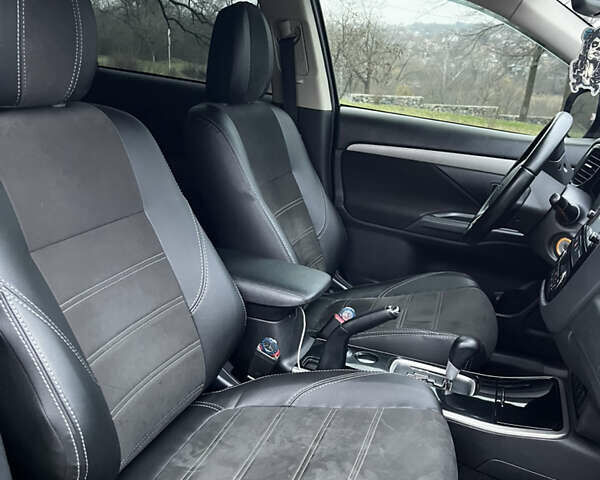 Синій Міцубісі Аутлендер, об'ємом двигуна 2.36 л та пробігом 144 тис. км за 16700 $, фото 18 на Automoto.ua