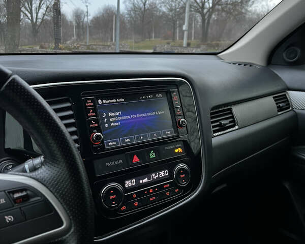 Синій Міцубісі Аутлендер, об'ємом двигуна 2.36 л та пробігом 144 тис. км за 16700 $, фото 16 на Automoto.ua