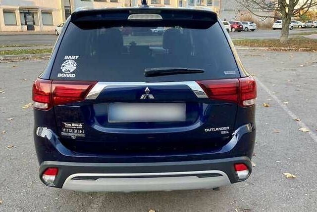 Синий Мицубиси Аутлендер, объемом двигателя 2.4 л и пробегом 71 тыс. км за 11800 $, фото 5 на Automoto.ua