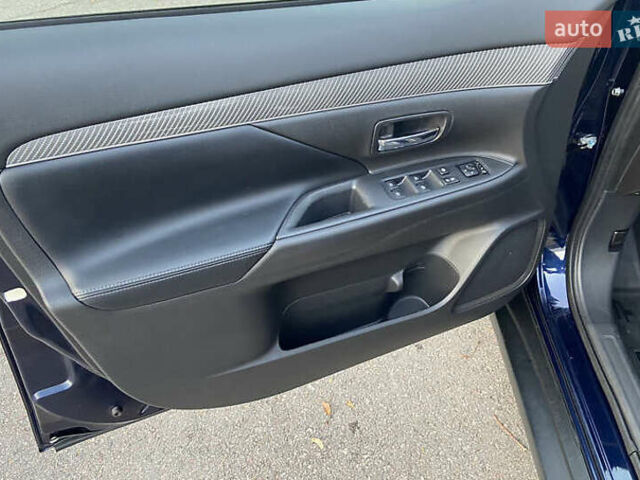 Синий Мицубиси Аутлендер, объемом двигателя 2.36 л и пробегом 71 тыс. км за 13800 $, фото 12 на Automoto.ua