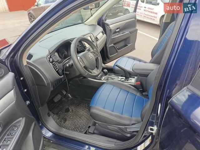 Синий Мицубиси Аутлендер, объемом двигателя 2.4 л и пробегом 134 тыс. км за 15200 $, фото 8 на Automoto.ua