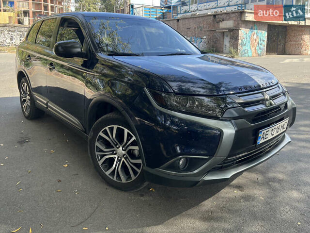 Синий Мицубиси Аутлендер, объемом двигателя 2.36 л и пробегом 150 тыс. км за 15500 $, фото 3 на Automoto.ua