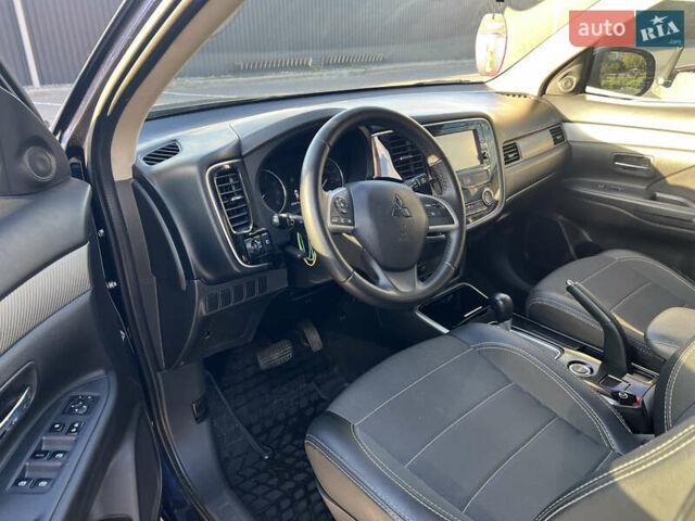 Синий Мицубиси Аутлендер, объемом двигателя 2.36 л и пробегом 150 тыс. км за 15500 $, фото 12 на Automoto.ua