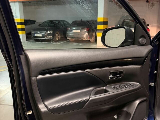 Синий Мицубиси Аутлендер, объемом двигателя 2 л и пробегом 128 тыс. км за 20000 $, фото 10 на Automoto.ua