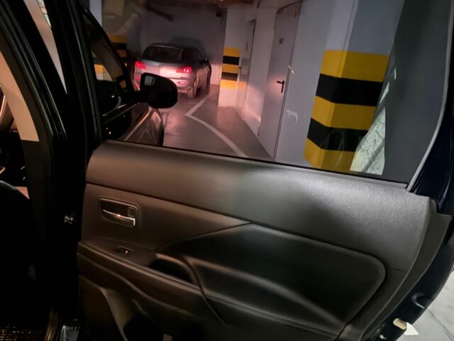 Синий Мицубиси Аутлендер, объемом двигателя 2 л и пробегом 128 тыс. км за 20000 $, фото 14 на Automoto.ua