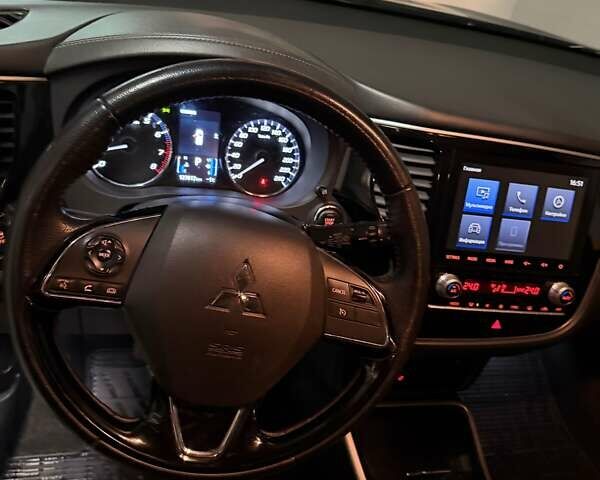 Синій Міцубісі Аутлендер, об'ємом двигуна 2 л та пробігом 128 тис. км за 20000 $, фото 8 на Automoto.ua