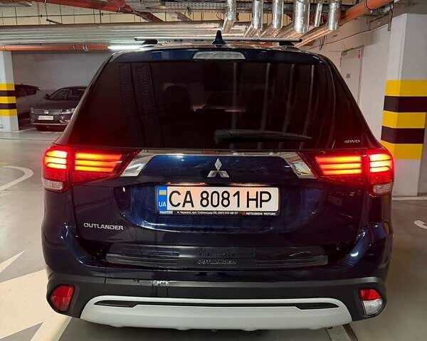 Синій Міцубісі Аутлендер, об'ємом двигуна 2 л та пробігом 128 тис. км за 20000 $, фото 4 на Automoto.ua