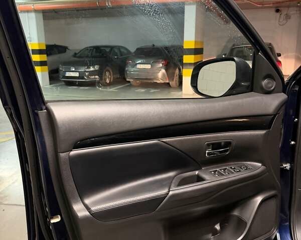 Синій Міцубісі Аутлендер, об'ємом двигуна 2 л та пробігом 128 тис. км за 20000 $, фото 9 на Automoto.ua