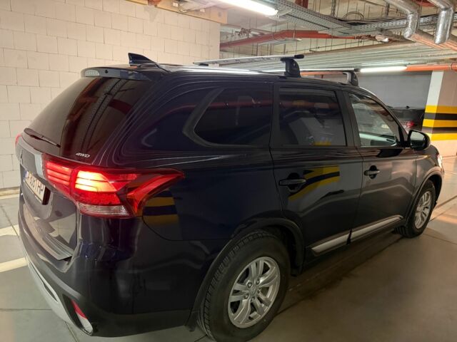 Синий Мицубиси Аутлендер, объемом двигателя 2 л и пробегом 128 тыс. км за 20000 $, фото 4 на Automoto.ua