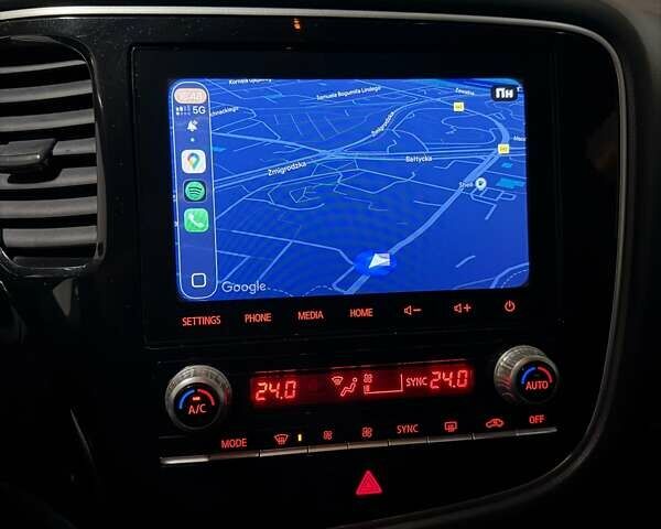 Синій Міцубісі Аутлендер, об'ємом двигуна 2 л та пробігом 128 тис. км за 20000 $, фото 1 на Automoto.ua