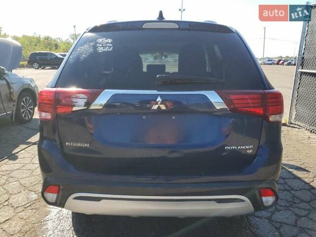 Синий Мицубиси Аутлендер, объемом двигателя 2.36 л и пробегом 187 тыс. км за 2900 $, фото 5 на Automoto.ua