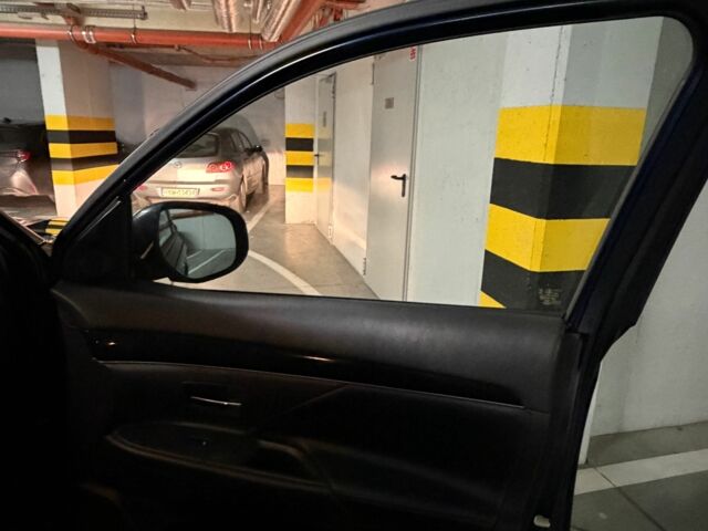 Синий Мицубиси Аутлендер, объемом двигателя 2 л и пробегом 128 тыс. км за 20000 $, фото 13 на Automoto.ua