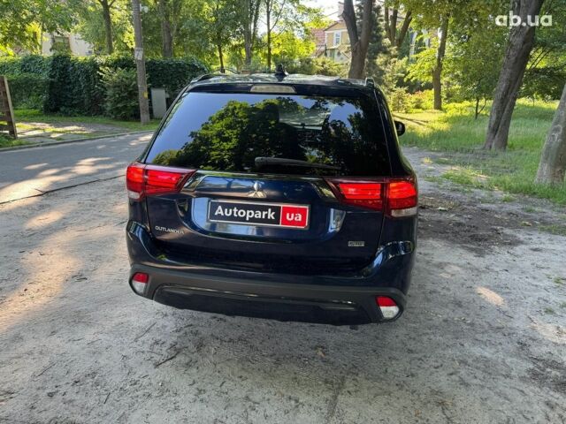 Синий Мицубиси Аутлендер, объемом двигателя 2.4 л и пробегом 75 тыс. км за 15990 $, фото 5 на Automoto.ua
