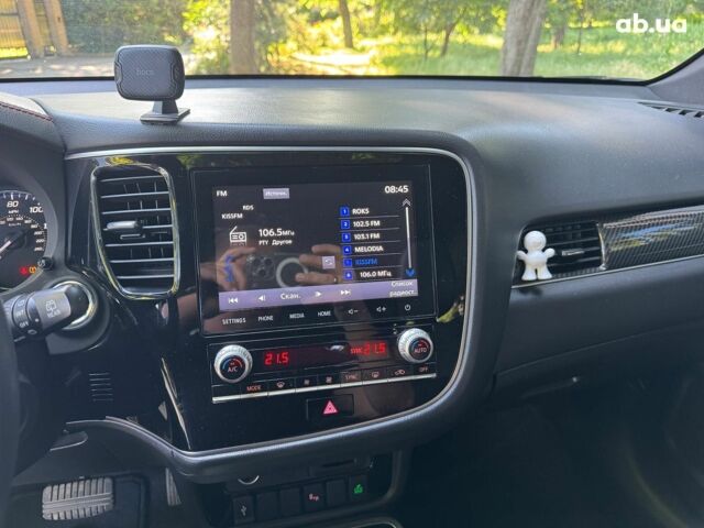 Синий Мицубиси Аутлендер, объемом двигателя 2.4 л и пробегом 75 тыс. км за 15990 $, фото 12 на Automoto.ua