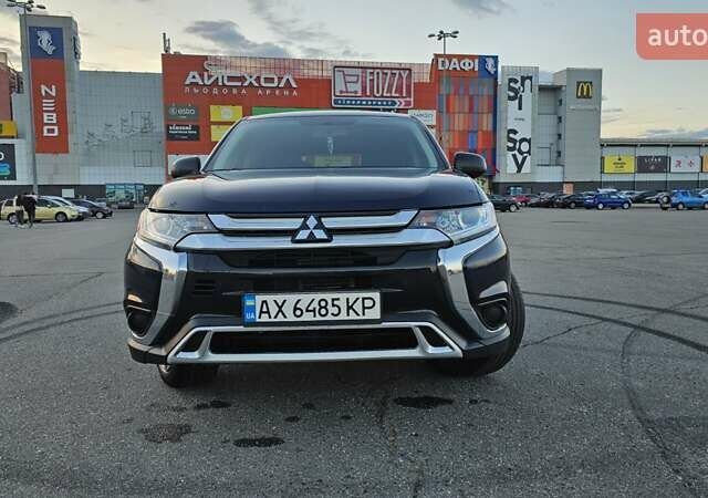 Синий Мицубиси Аутлендер, объемом двигателя 2.4 л и пробегом 106 тыс. км за 16500 $, фото 8 на Automoto.ua
