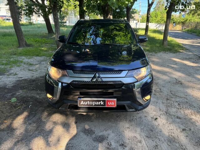 Синий Мицубиси Аутлендер, объемом двигателя 2.4 л и пробегом 75 тыс. км за 15990 $, фото 1 на Automoto.ua