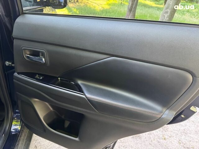 Синий Мицубиси Аутлендер, объемом двигателя 2.4 л и пробегом 75 тыс. км за 15990 $, фото 18 на Automoto.ua