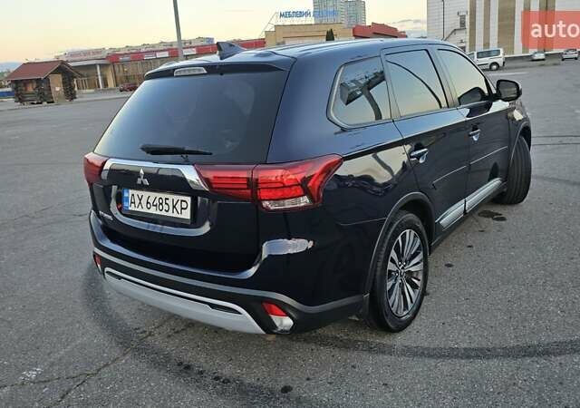 Синий Мицубиси Аутлендер, объемом двигателя 2.4 л и пробегом 106 тыс. км за 16500 $, фото 11 на Automoto.ua