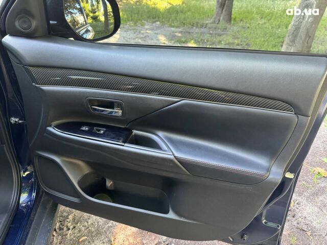 Синий Мицубиси Аутлендер, объемом двигателя 2.4 л и пробегом 75 тыс. км за 15990 $, фото 20 на Automoto.ua