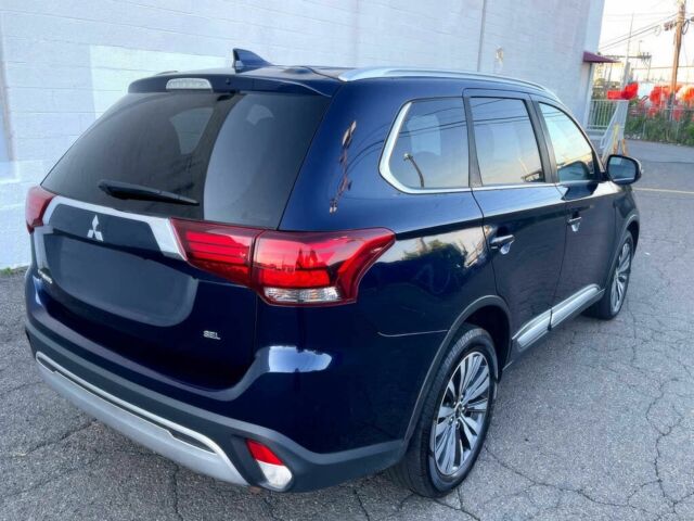 Синій Міцубісі Аутлендер, об'ємом двигуна 2.4 л та пробігом 40 тис. км за 5800 $, фото 4 на Automoto.ua