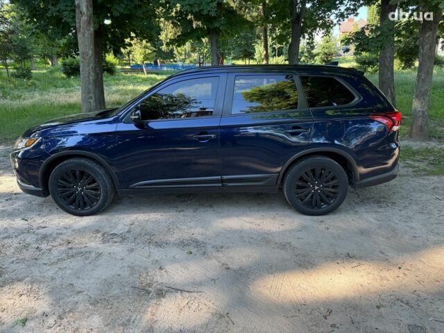 Синий Мицубиси Аутлендер, объемом двигателя 2.4 л и пробегом 75 тыс. км за 15990 $, фото 7 на Automoto.ua