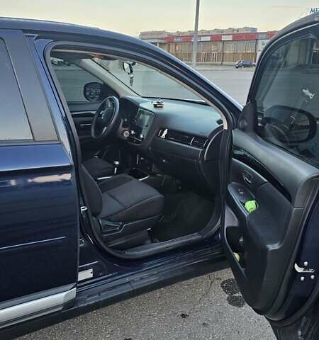 Синий Мицубиси Аутлендер, объемом двигателя 2.4 л и пробегом 106 тыс. км за 16500 $, фото 13 на Automoto.ua