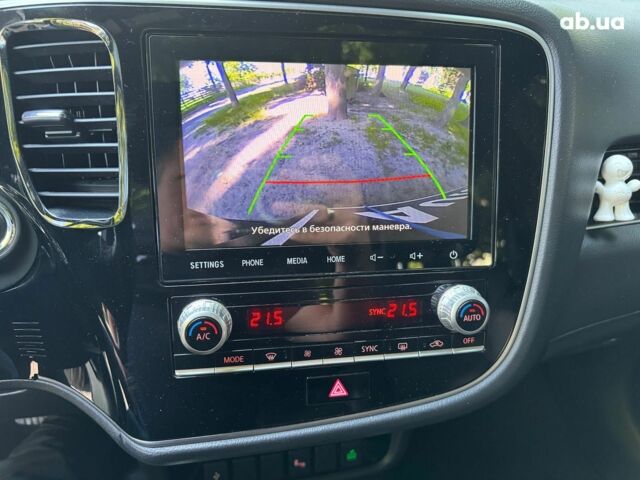 Синий Мицубиси Аутлендер, объемом двигателя 2.4 л и пробегом 75 тыс. км за 15990 $, фото 13 на Automoto.ua