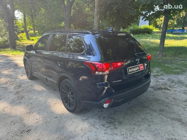 Синий Мицубиси Аутлендер, объемом двигателя 2.4 л и пробегом 75 тыс. км за 15990 $, фото 6 на Automoto.ua