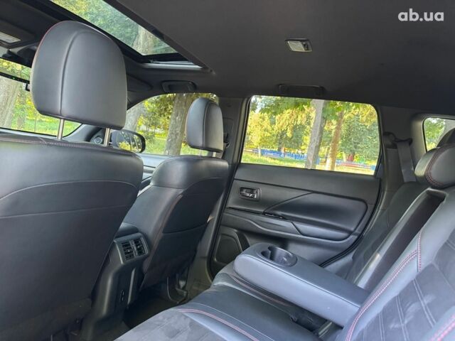 Синий Мицубиси Аутлендер, объемом двигателя 2.4 л и пробегом 75 тыс. км за 15990 $, фото 16 на Automoto.ua