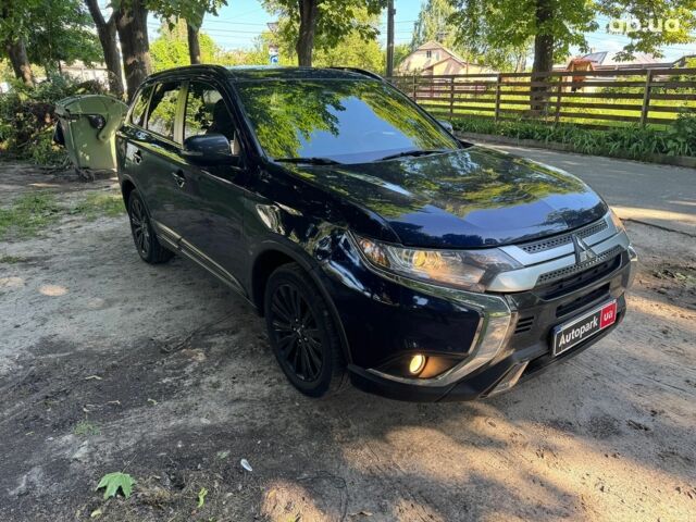 Синий Мицубиси Аутлендер, объемом двигателя 2.4 л и пробегом 75 тыс. км за 15990 $, фото 2 на Automoto.ua