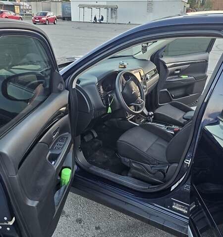 Синий Мицубиси Аутлендер, объемом двигателя 2.4 л и пробегом 106 тыс. км за 16500 $, фото 15 на Automoto.ua