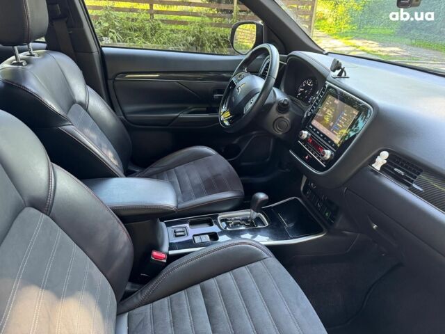 Синий Мицубиси Аутлендер, объемом двигателя 2.4 л и пробегом 75 тыс. км за 15990 $, фото 21 на Automoto.ua