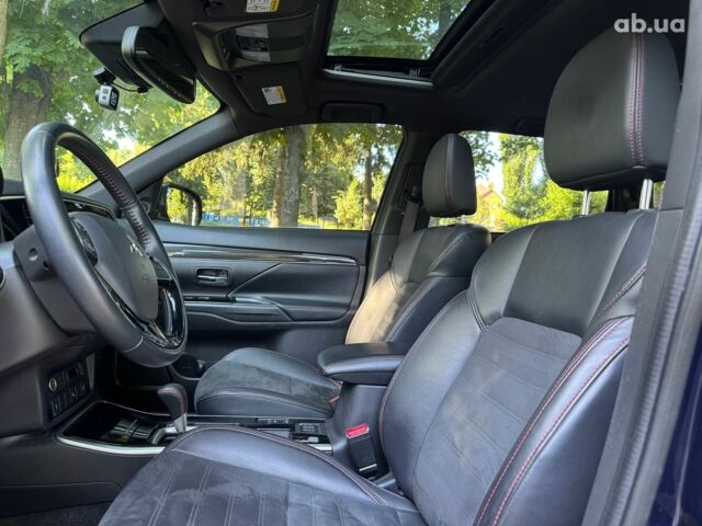 Синий Мицубиси Аутлендер, объемом двигателя 2.4 л и пробегом 75 тыс. км за 15990 $, фото 10 на Automoto.ua