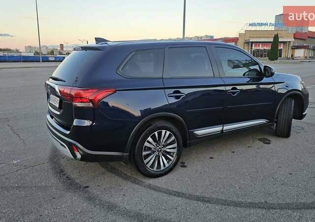 Синий Мицубиси Аутлендер, объемом двигателя 2.4 л и пробегом 106 тыс. км за 16500 $, фото 10 на Automoto.ua