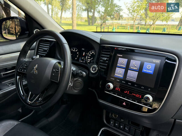 Міцубісі Аутлендер 2021 у Києві на Automoto.ua Синій Міцубісі Аутлендер, об'ємом двигуна 2.36 л та пробігом 70 тис. км за 24000 $, фото 38 на Automoto.ua