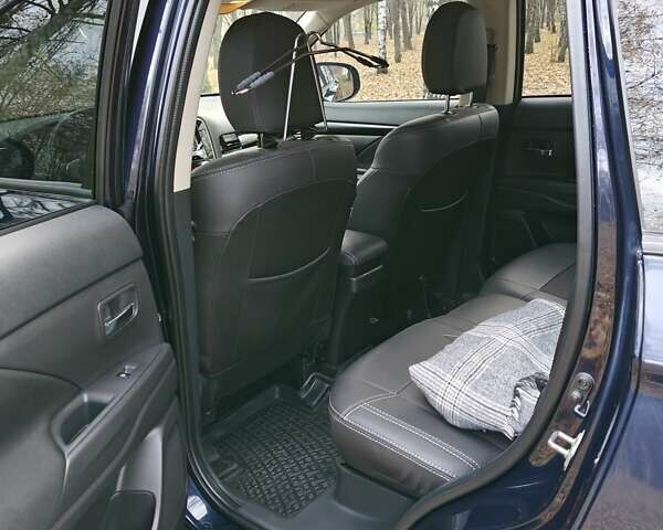 Синий Мицубиси Аутлендер, объемом двигателя 2 л и пробегом 68 тыс. км за 22000 $, фото 22 на Automoto.ua