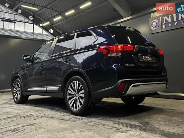 Синий Мицубиси Аутлендер, объемом двигателя 2 л и пробегом 62 тыс. км за 20500 $, фото 12 на Automoto.ua