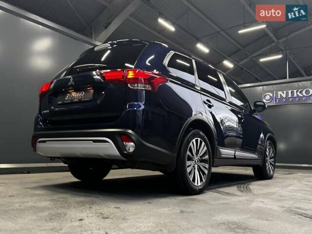 Синий Мицубиси Аутлендер, объемом двигателя 2 л и пробегом 62 тыс. км за 20500 $, фото 1 на Automoto.ua