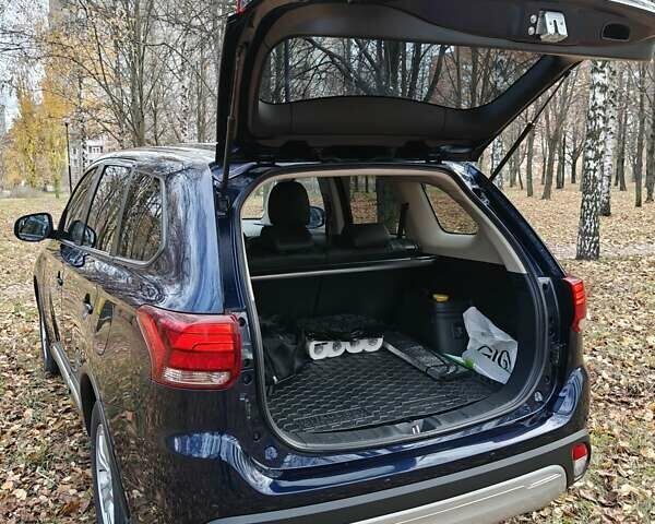 Синий Мицубиси Аутлендер, объемом двигателя 2 л и пробегом 68 тыс. км за 22000 $, фото 36 на Automoto.ua