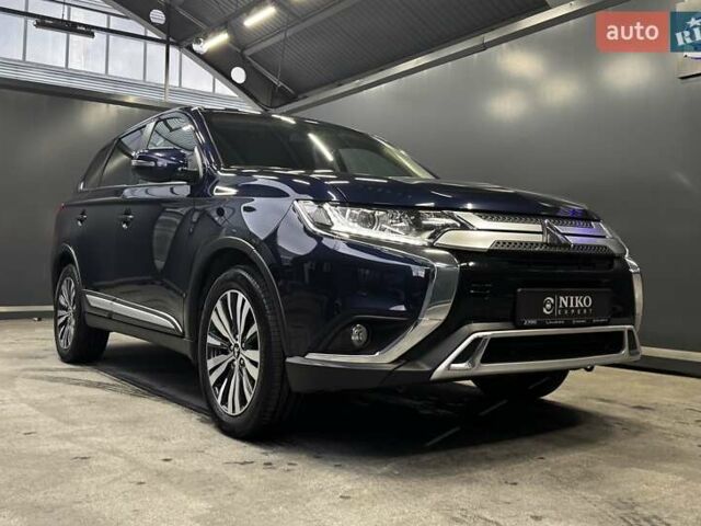 Синий Мицубиси Аутлендер, объемом двигателя 2 л и пробегом 62 тыс. км за 20500 $, фото 23 на Automoto.ua