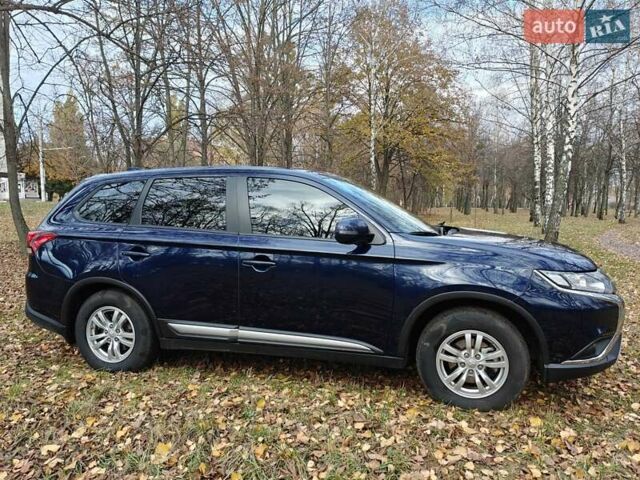 Синий Мицубиси Аутлендер, объемом двигателя 2 л и пробегом 68 тыс. км за 22000 $, фото 4 на Automoto.ua
